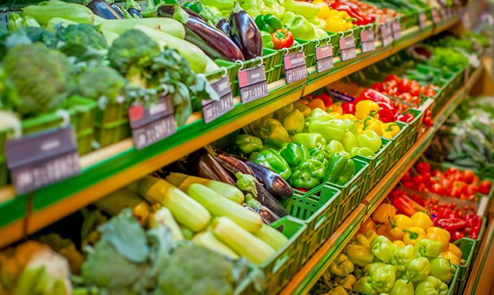 Fresh produce on shelves at grocery store